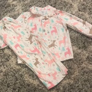 2 pjs one is red and other with rain deer